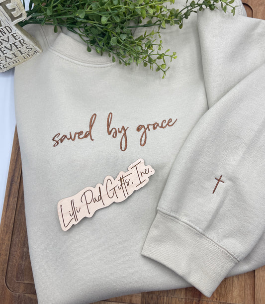 Embroidered saved by grace cross sleeve crewneck sweatshirt